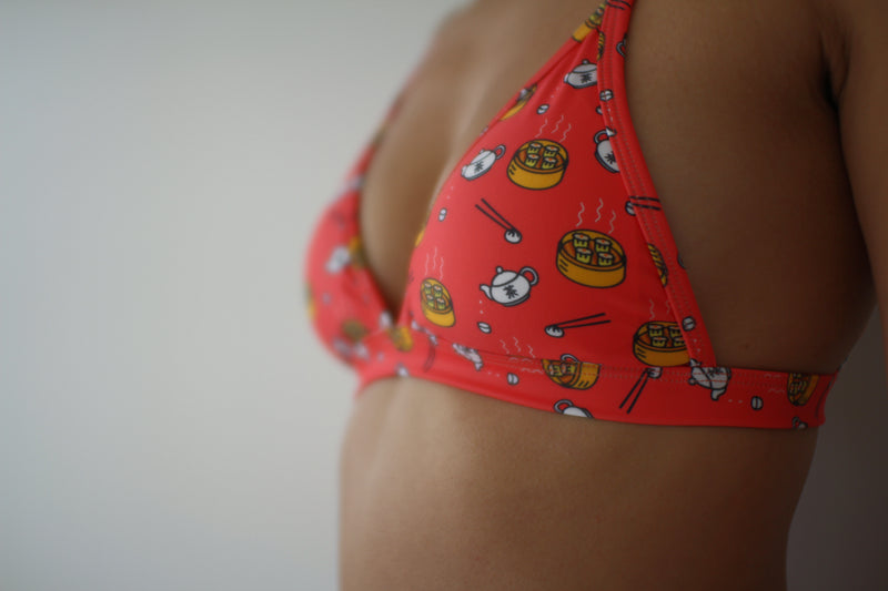 Suns Out Buns Out bikini top by Haishang